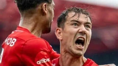 人民日报深度解析：短道速滑赛道浇水奥秘全解